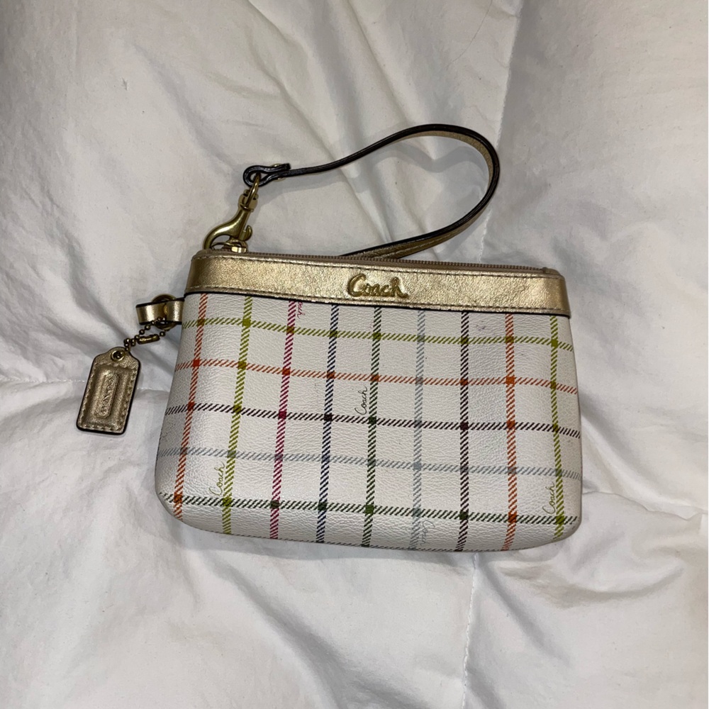 Small stripped coach wristlet